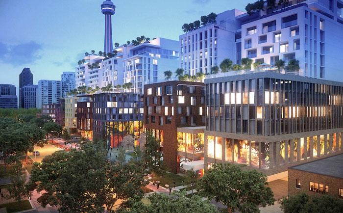 The Well Townhomes with CN Tower in the distance
