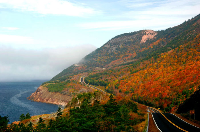The Cabot Trail in the Fall with orange leaves