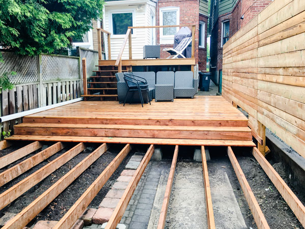 backyard fence and deck being built